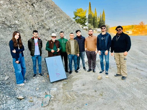 Petroleum and Mining Engineering, geological field trip, TIU, Erbil, Shaqlawa, rock formations, Upper Bakhtiari, Pirmam Anticline, dip and strike, lithology, structural geology, second-grade students, geology education.