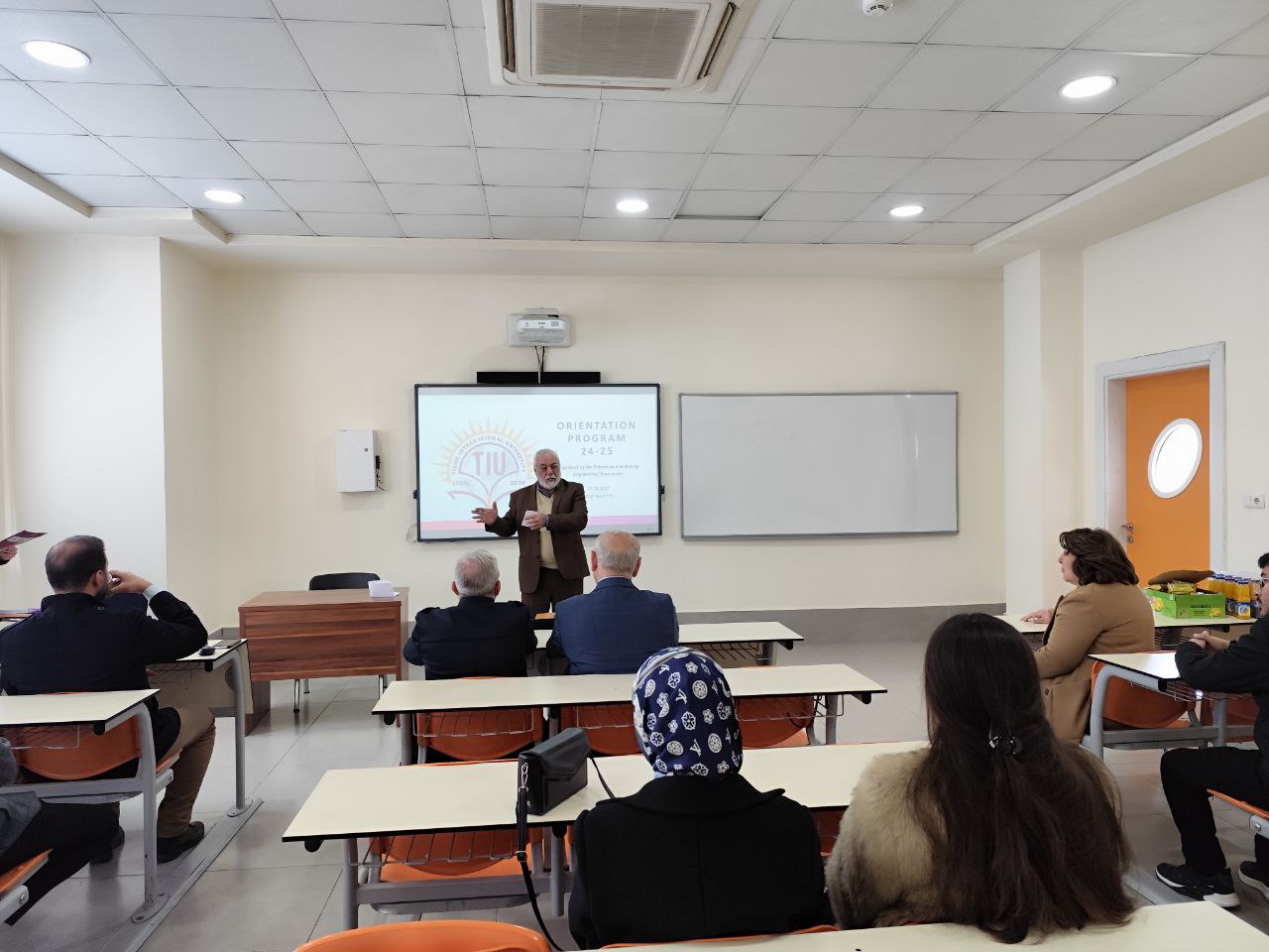 Petroleum and Mining Engineering, TIU, orientation program, welcoming ceremony, first-year students, Dr. Sultan Abu-Orabi, Dr. Jwan Jalal, Dr. Fadhil Ali, student orientation, university introduction video, university policies, curriculum, student information system, non-curricular activities, university facilities, department laboratories, student integration, TIU community.