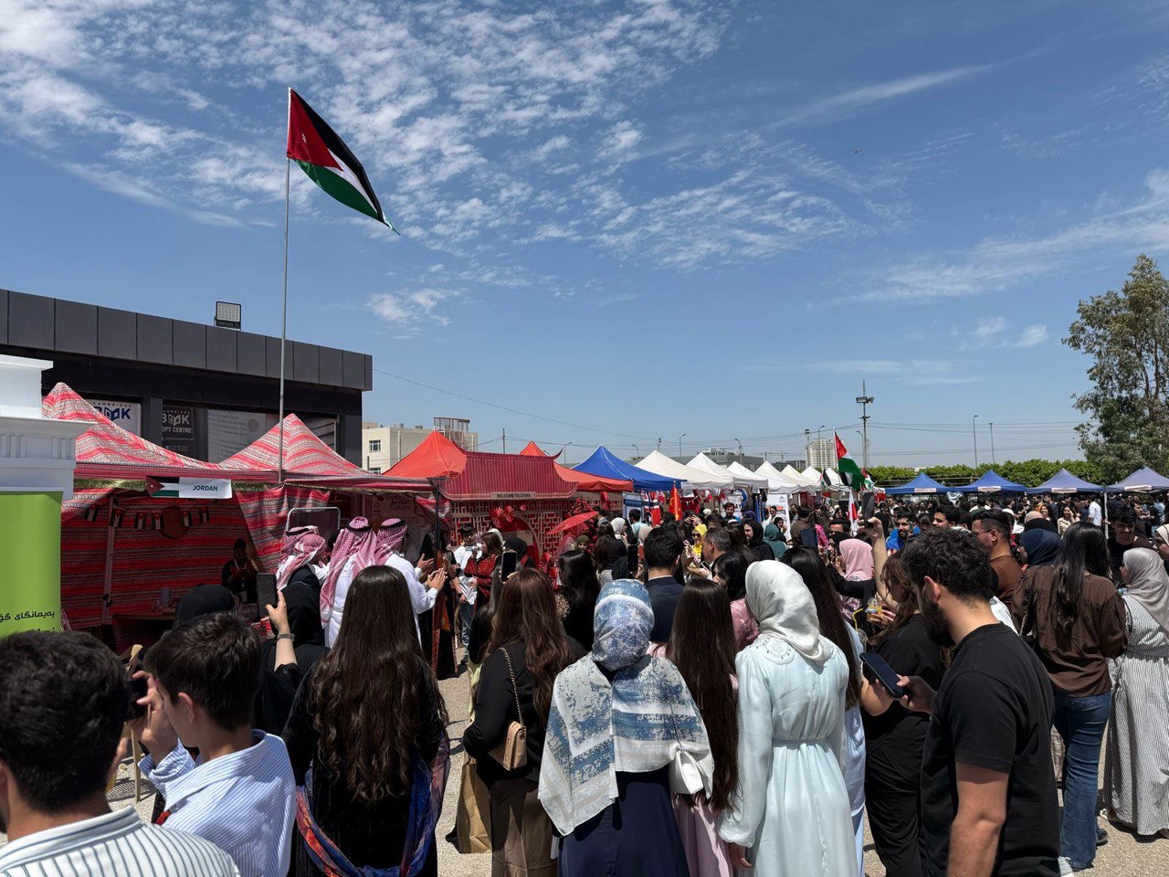 Jordan Tent, PAME, Spring Festival, Tishk International University, Jordanian culture, student involvement, traditional food, cultural celebration, Erbil events, embassy support
