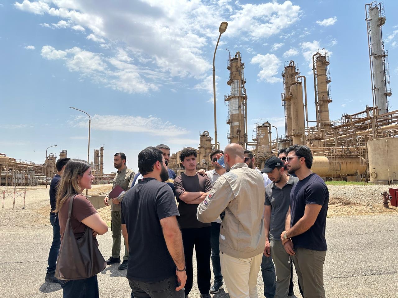 North Gas Company engineers explaining gas production processes to TIU students.